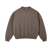 A plain crewneck sweatshirt in a heathered brown color, laid flat against a light textured background. Text below reads 'CELINE BROWN'.