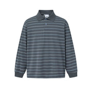 A long-sleeve polo shirt with horizontal gray and white stripes, featuring a dark gray collar and cuffs, displayed on a solid white background.