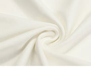 Close-up of white fabric with folds